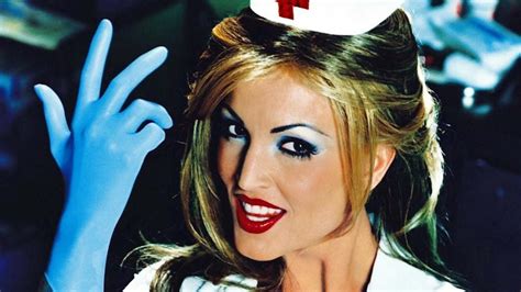 The cover artwork for Enema of the State features porn star Janine Lindemulder famously clad in a nurse uniform, and the title is a pun on the term enemy of the ...